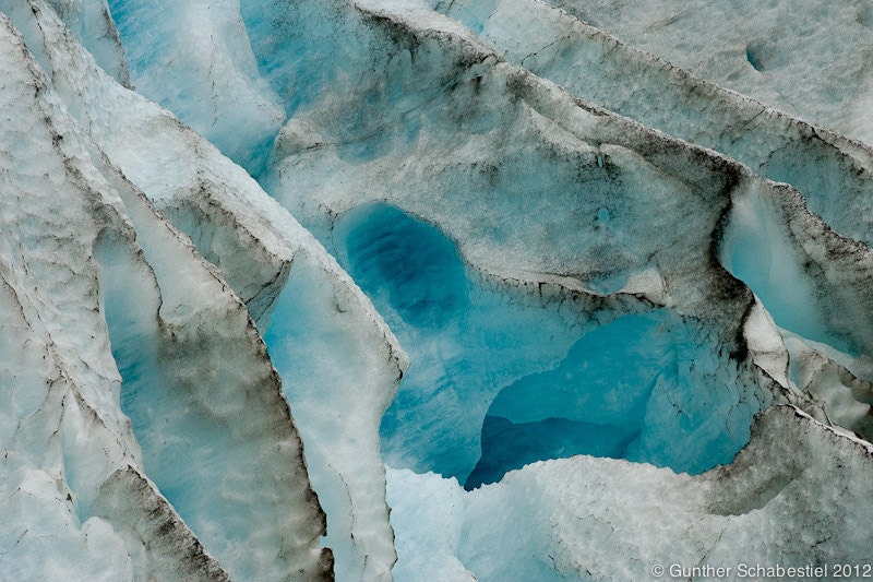 Glacier Ice detail closeup of Exit Glacier in Alaska, deep blue ice