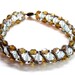 Ice blue bracelet woven with bronze crystals