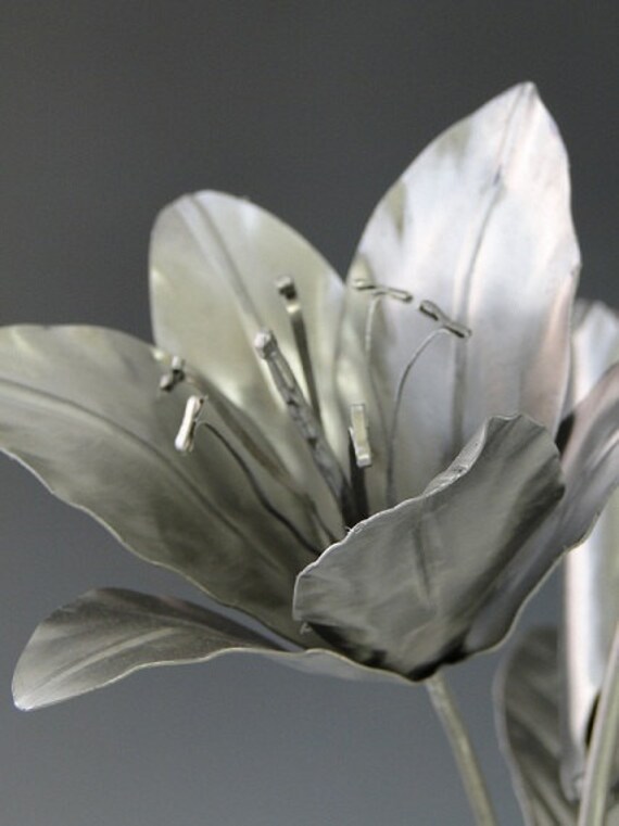 Metal Lily sculpture via Etsy: NatureofSteel