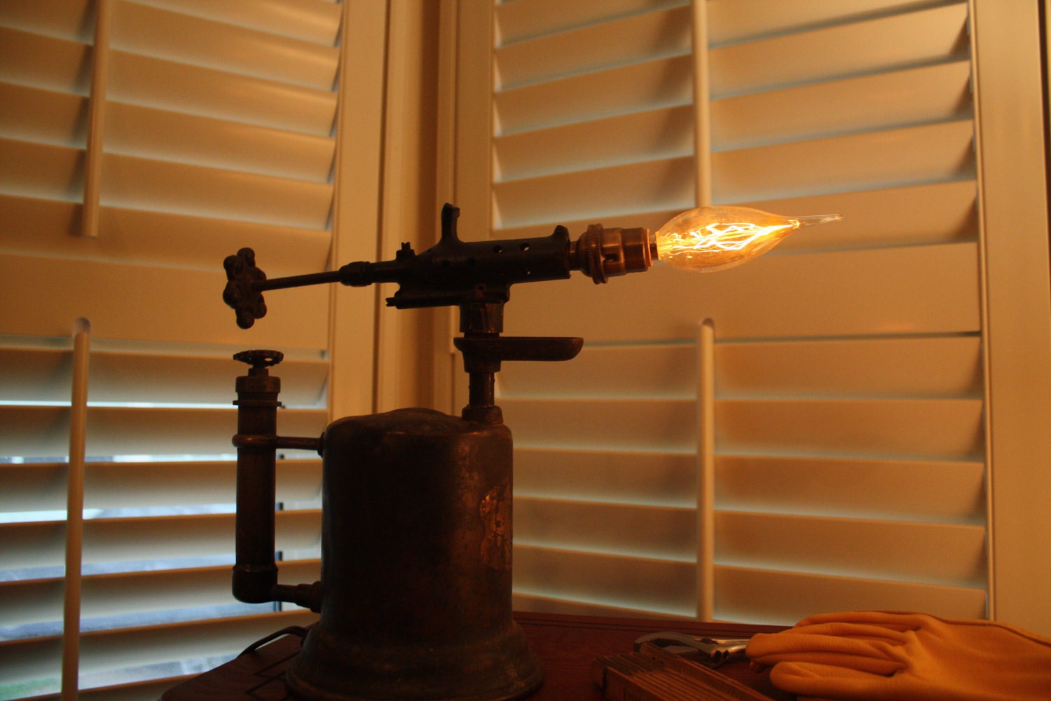 Antique brass blowtorch lamp.