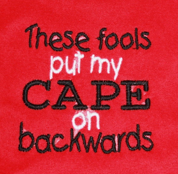 These fools put my CAPE on backwards embroidered bib
