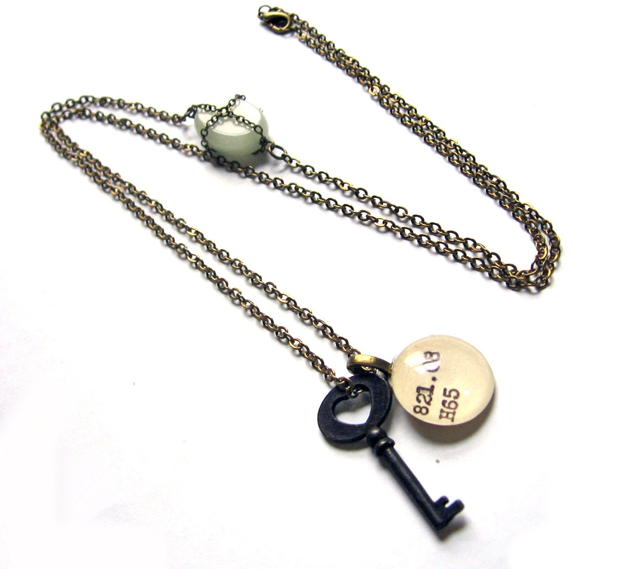Extra Long Necklace with Green Milk Glass Accent and Skeleton Key Reclaimed Library Card Pendant