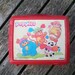 vintage 80s lunchbox Popples cartoon playing football. saturday morning cartoons nostalgia.