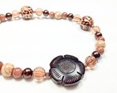 Little Girl's Necklace Crafted with Leopard Print Beads, Glass Pearls, Goldstone Beads, and a Beautiful Wood Sunflower.