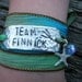 The Hunger Games Inspired Bracelet Wrap TEAM FINNICK Hand Stamped with Sand and Sea Silk Ribbon Wrap