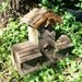 Old fashion rustic style birdhouse condo with wood shingle roof