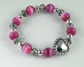 Pink Cats Eye Stretch Bracelet with Silver Heart Bead