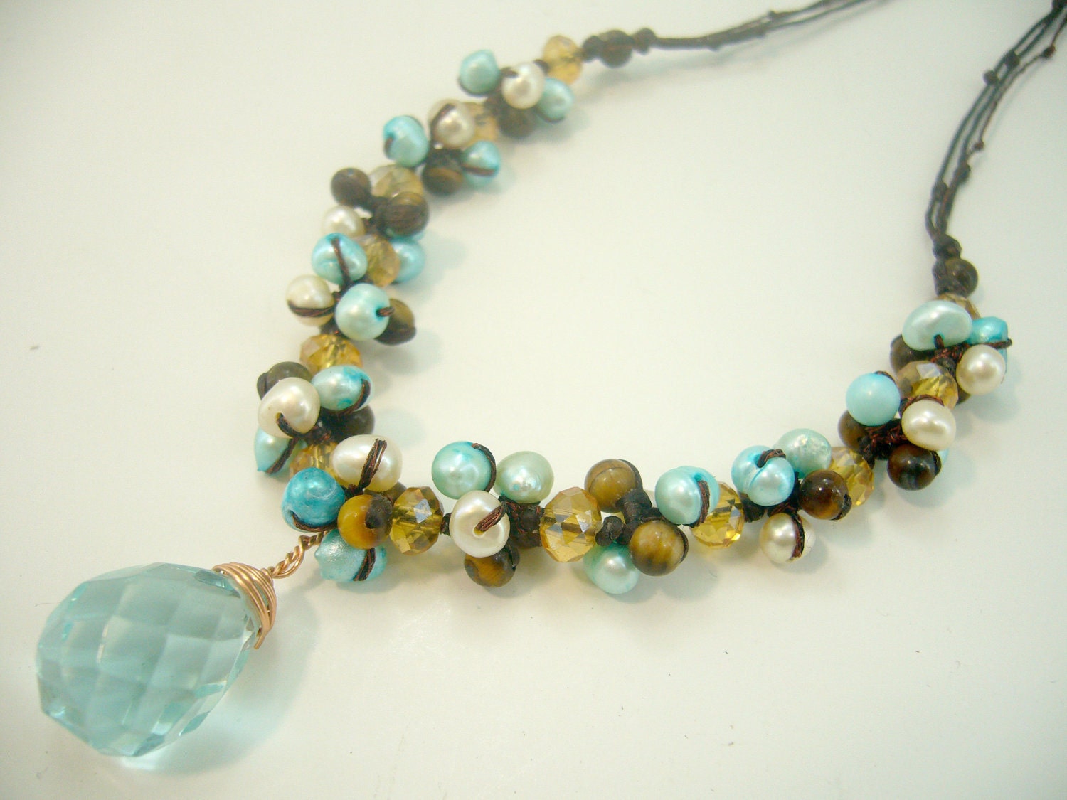 Blue topaz,tiger eye,crystal,freshwater pearl necklace.
