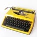 Bright Yellow Triumph Typewriter Tippa Adler - made in Holland - manual retro Typewriter