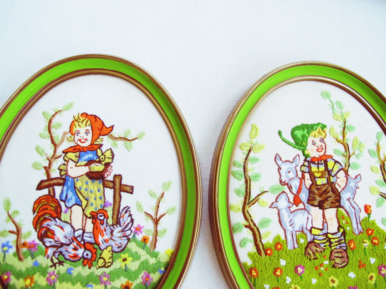 in stitches - vintage pair of kitschy needlepoint farm hummels in oval frames - lime green