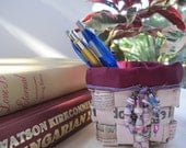 Colorful handwoven mini paper basket made from an Italian newspaper