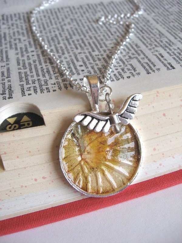 Cracked angel pendant and charm necklace