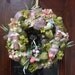 Pastel color deco mesh Easter wreath with antique looking Easter bunnies
