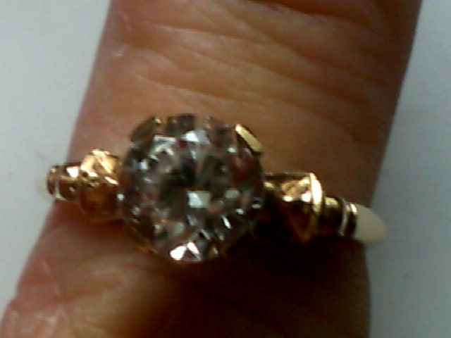 Engagement ring in 14kt yellow gold and 1.20ct YAG diamond simulant