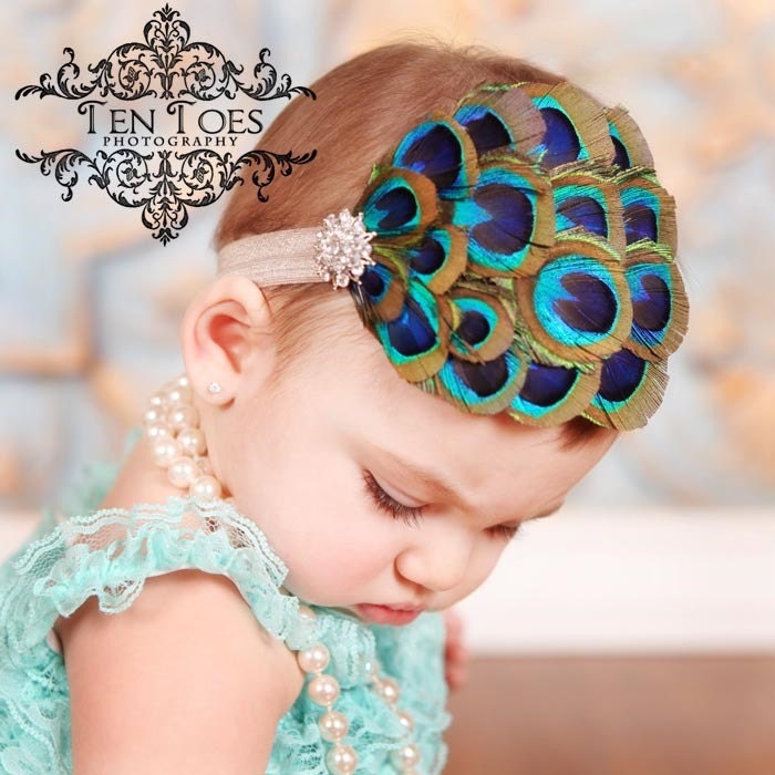 Gorgeous Nagorie Peacock Feather Headband with stunning crystal detail on soft elastic or clip.
