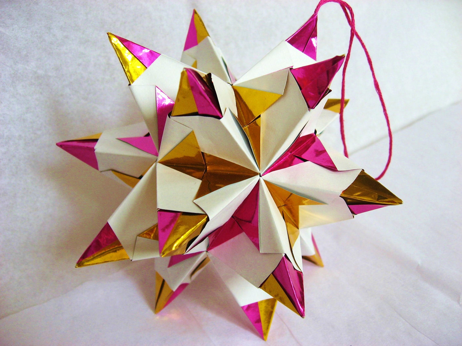 Origami Bascetta star ornament - Modular - Kusudama star made with gold and rose foil paper