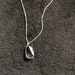 Sterling silver Möbius strip pendant