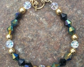 Black Firepolished Faceted Glass with Clear Vintage Crystals and Gold Toggle Bracelet