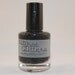 Spotty Dottie Dark - clear base with black glitter nail polish