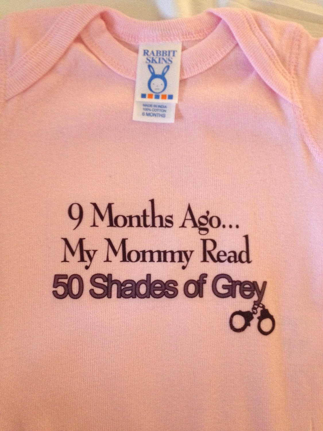Pink 9 Months Ago My Mommy Read 50 Shades of Grey Onesie (MADE TO ORDER) Can also be done in white for boys