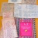 Large lot of Hot iron transfers with 140 page book on Embroidery stitches in color, popular transfers