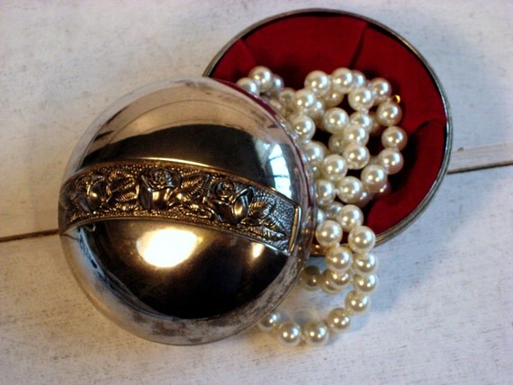 Vintage Silver plate jewelry box with red velvet lining and an aged patina
