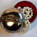 Vintage Silver plate jewelry box with red velvet lining and an aged patina