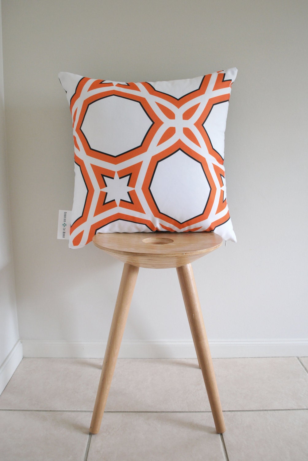 Orange Spirit Cushion Cover- A geometric pattern in orange and black