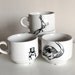 Dapper Flamingo stacking teacups