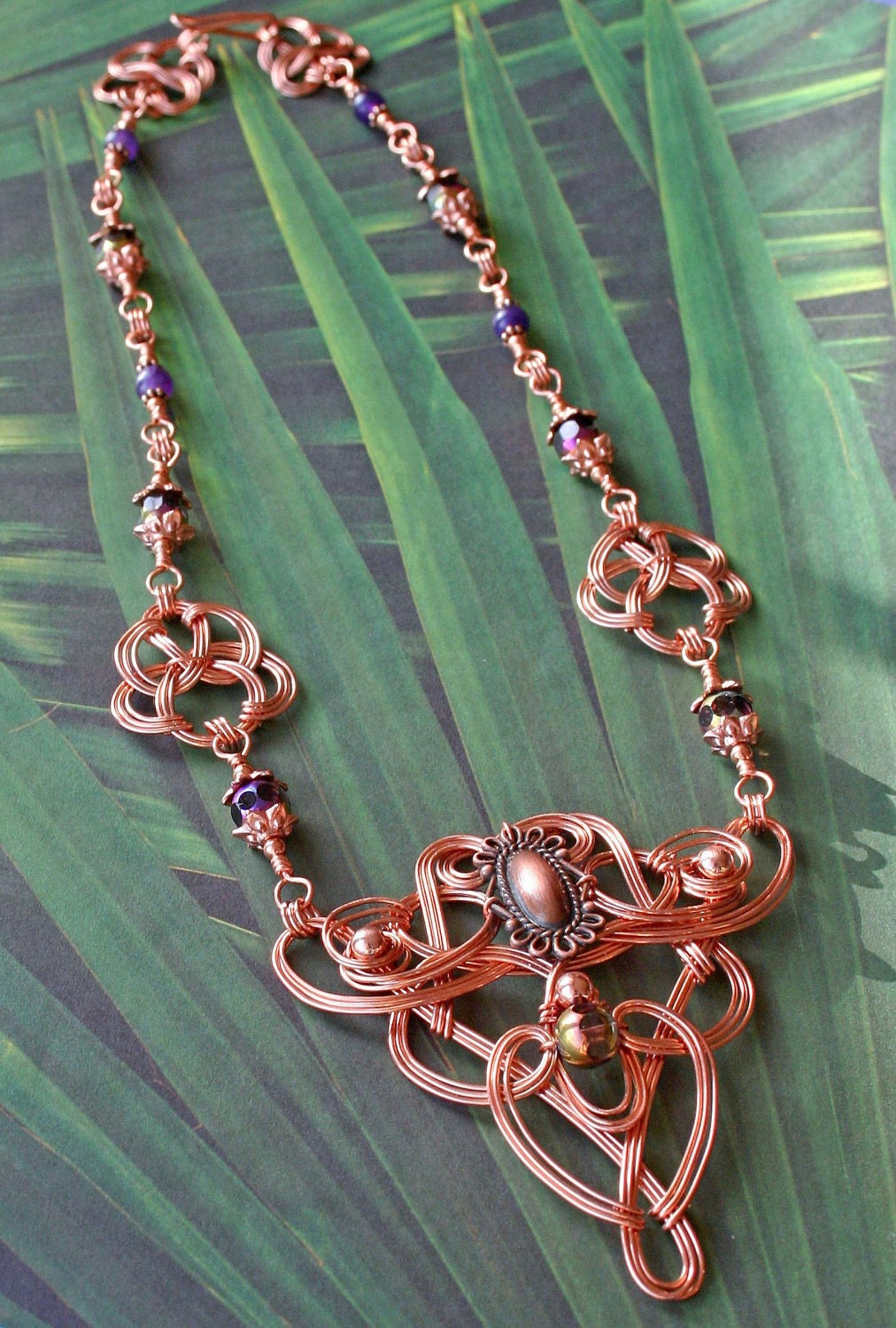 Copper Wire-wrapped Celtic Styled Necklace With Amethyst, Copper and Faceted Irridescent Beads.