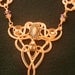 Copper Wire-wrapped Celtic Styled Necklace With Amethyst, Copper and Faceted Irridescent Beads.