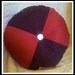 Burgundy Red Maroon and Brown Swirl Round Accent Pillow with Gold Button Detail