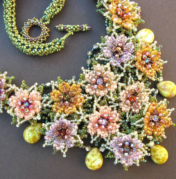 Beaded flower necklace in purple, pink, orange and green
