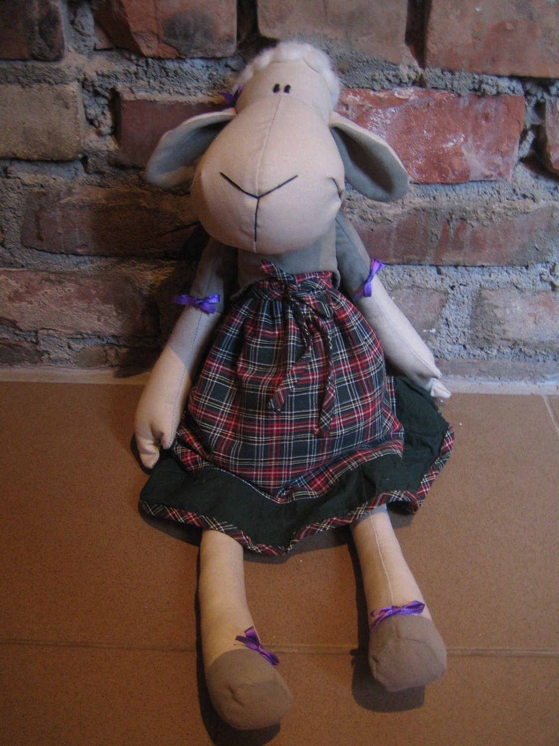 Handmade sheep-doll in dark green dress