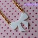 White Laser Cut Bow Necklace