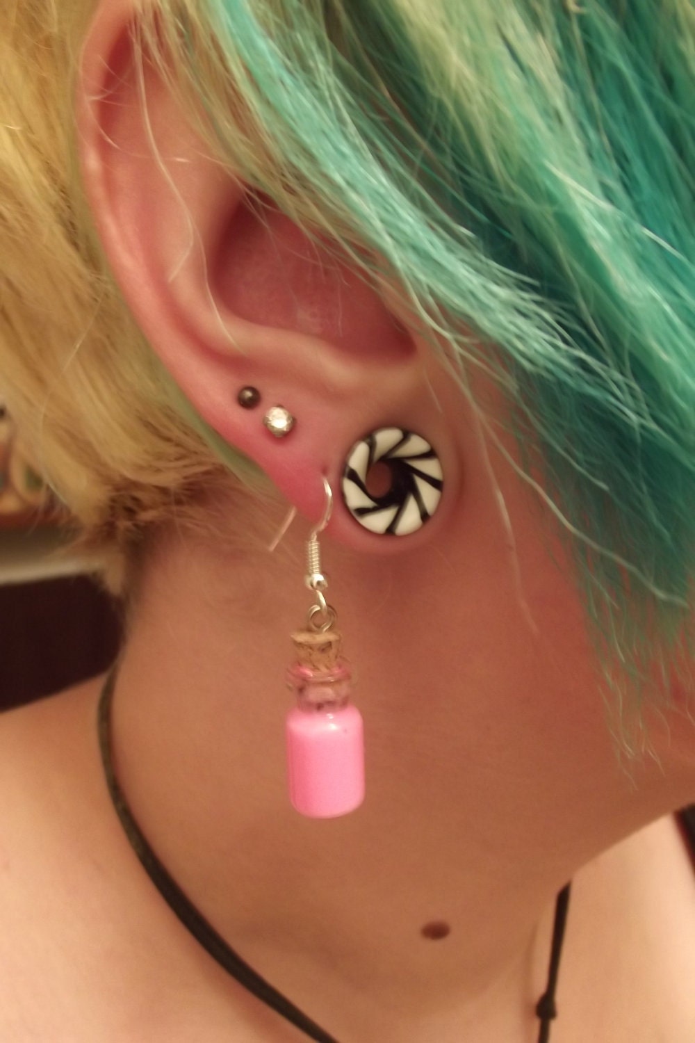 Glow in the dark potion earrings