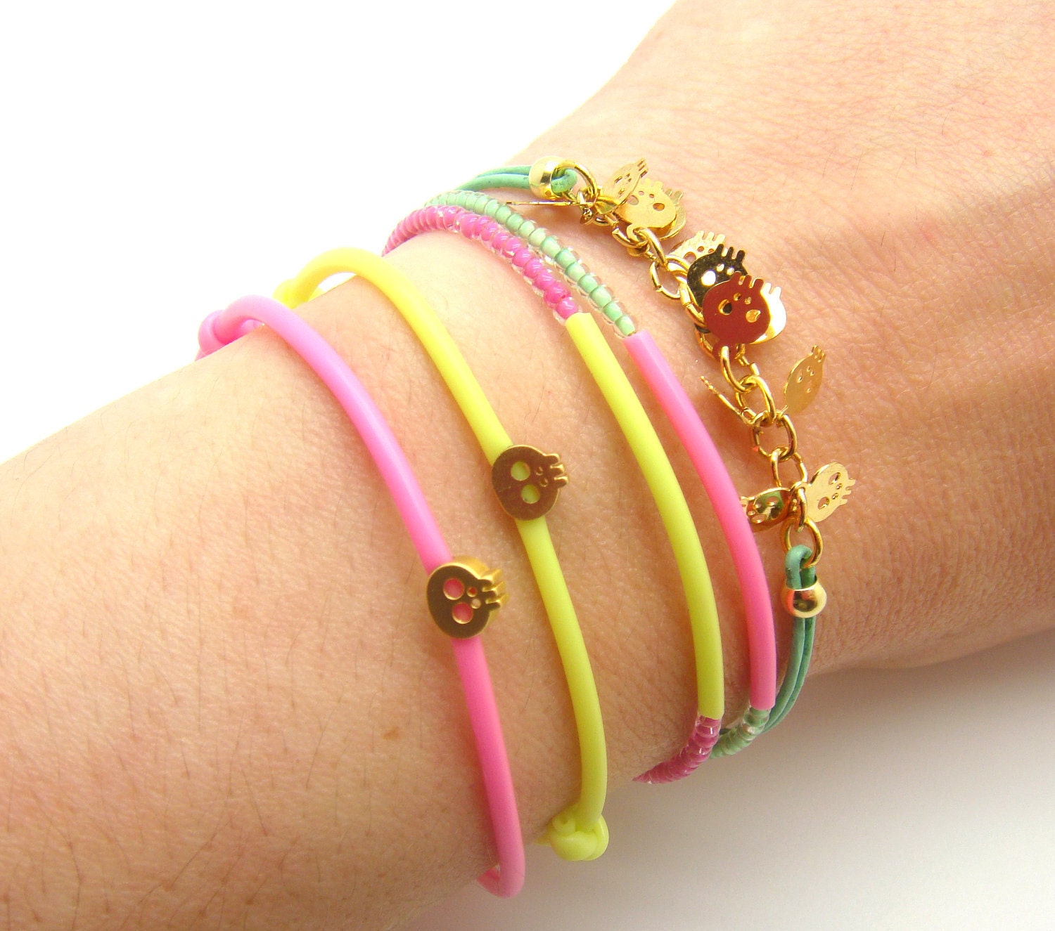Tiny Skull Bracelet - Pastel Mint Leather W/ Tiny Gold Plated Skulls - Pink Tassel