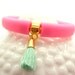 Neon Bracelet TREND - Neon Pink Rubber Bracelet w/ Gold Fish Charm , Swarovski Mint Bead & Mint Tassel