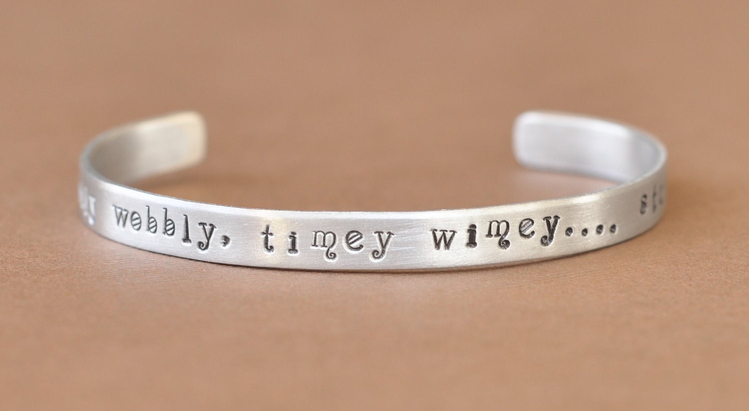 Hand stamped bracelet - Doctor Who Inspired - wibbly wobbly, timey wimey.... stuff