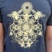 Bee Mandala Screen Print in Bright Honey Yellow on a Heathered Charcoal Colored SoftStyle Tshirt