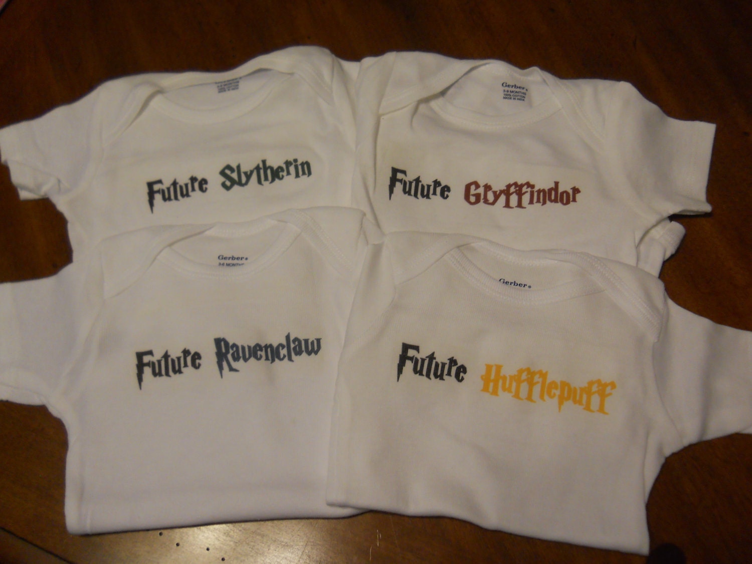 Hogwarts Houses Onesie Gift Set. Gryffindor, Slytherin, Ravenclaw and Hufflepuff. Can Be Customized By Size.