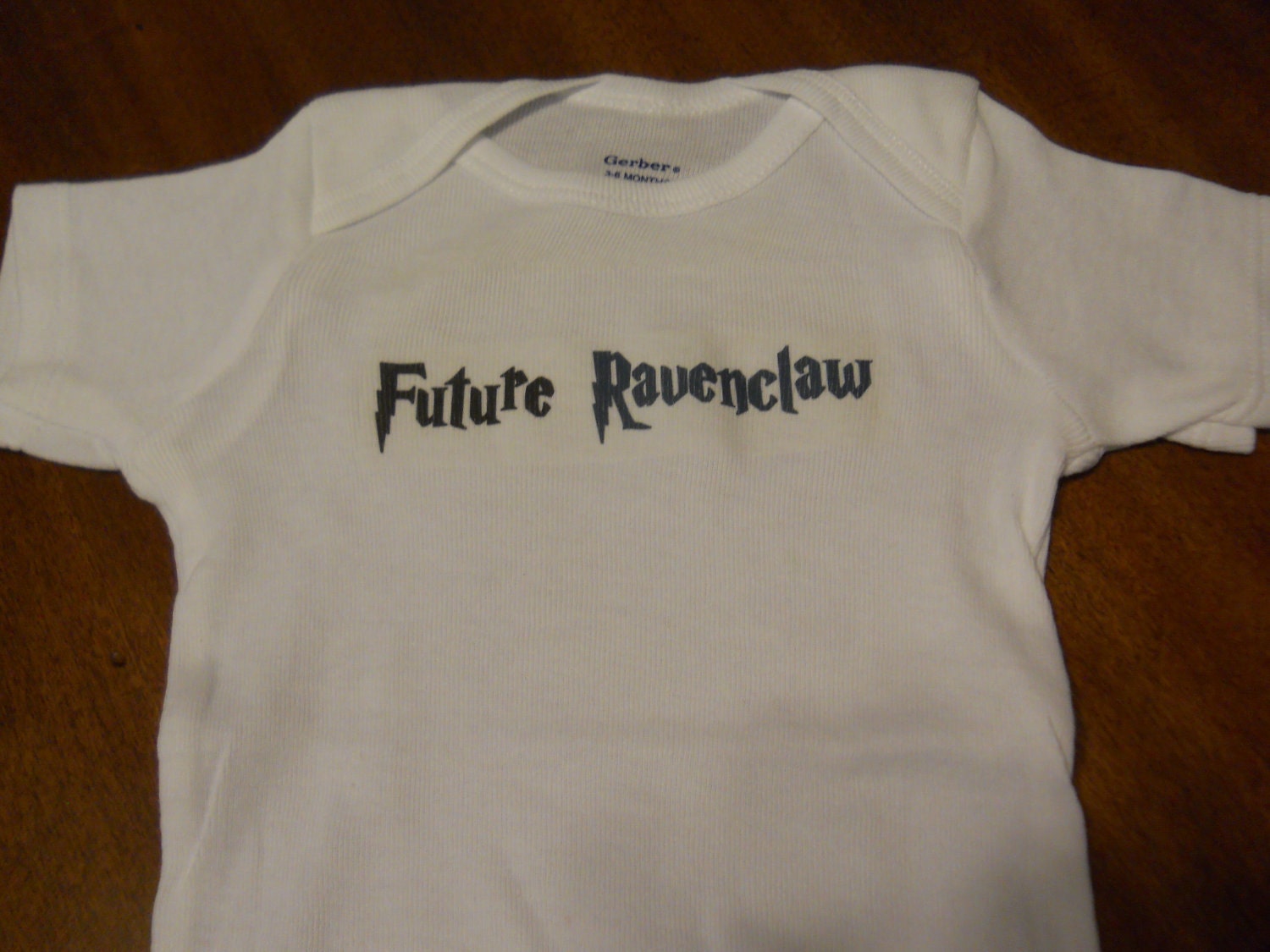 Hogwarts Houses Onesie Gift Set. Gryffindor, Slytherin, Ravenclaw and Hufflepuff. Can Be Customized By Size.