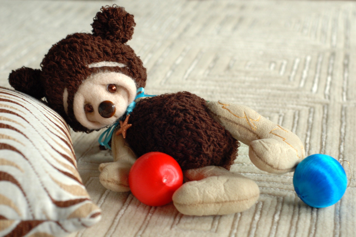 Shy  Baby bear. One of the kind. Brown and biege. Jointed. Knitted. Sewed. Felted.