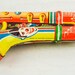 Vintage - Tin toy trumpet with lithographed images (clown) - Made in Western Germany