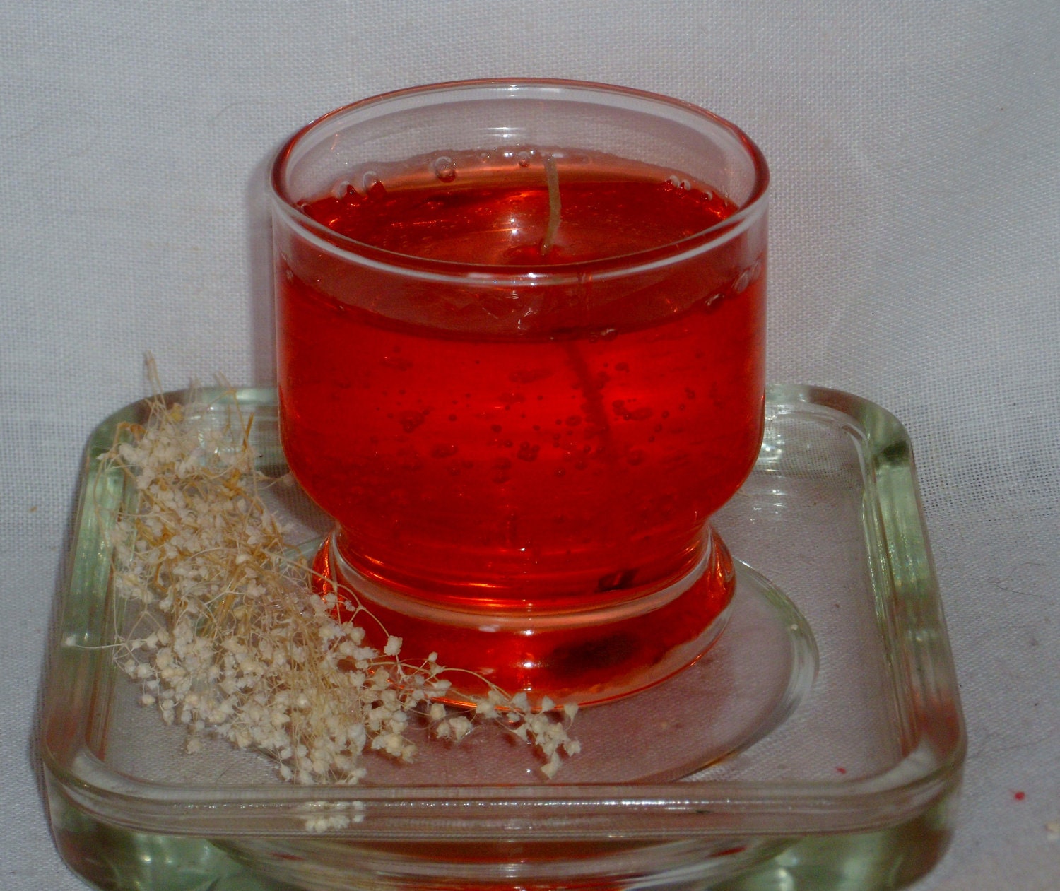 Gel candle of Cinnamon scent in glass container