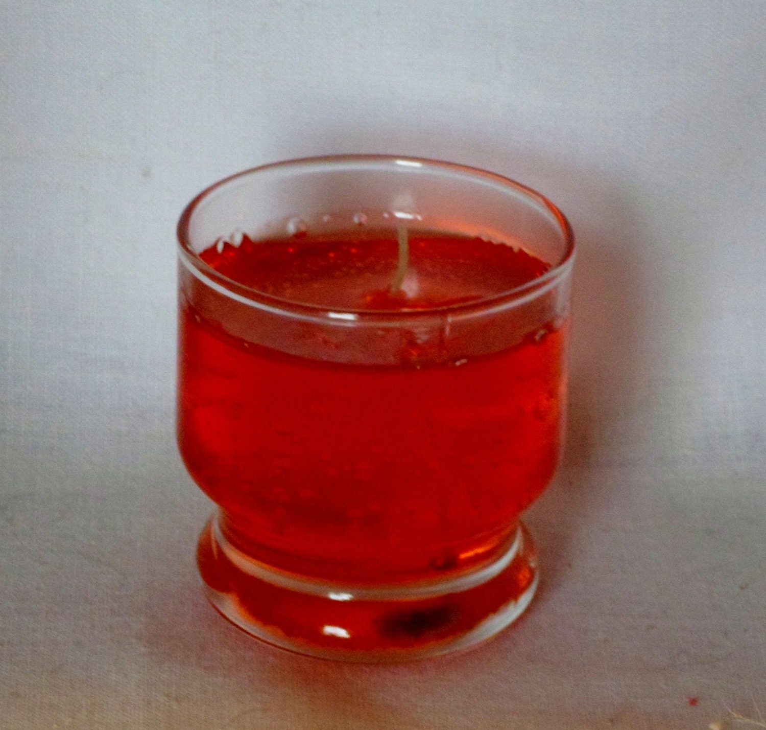 Gel candle of Cinnamon scent in glass container