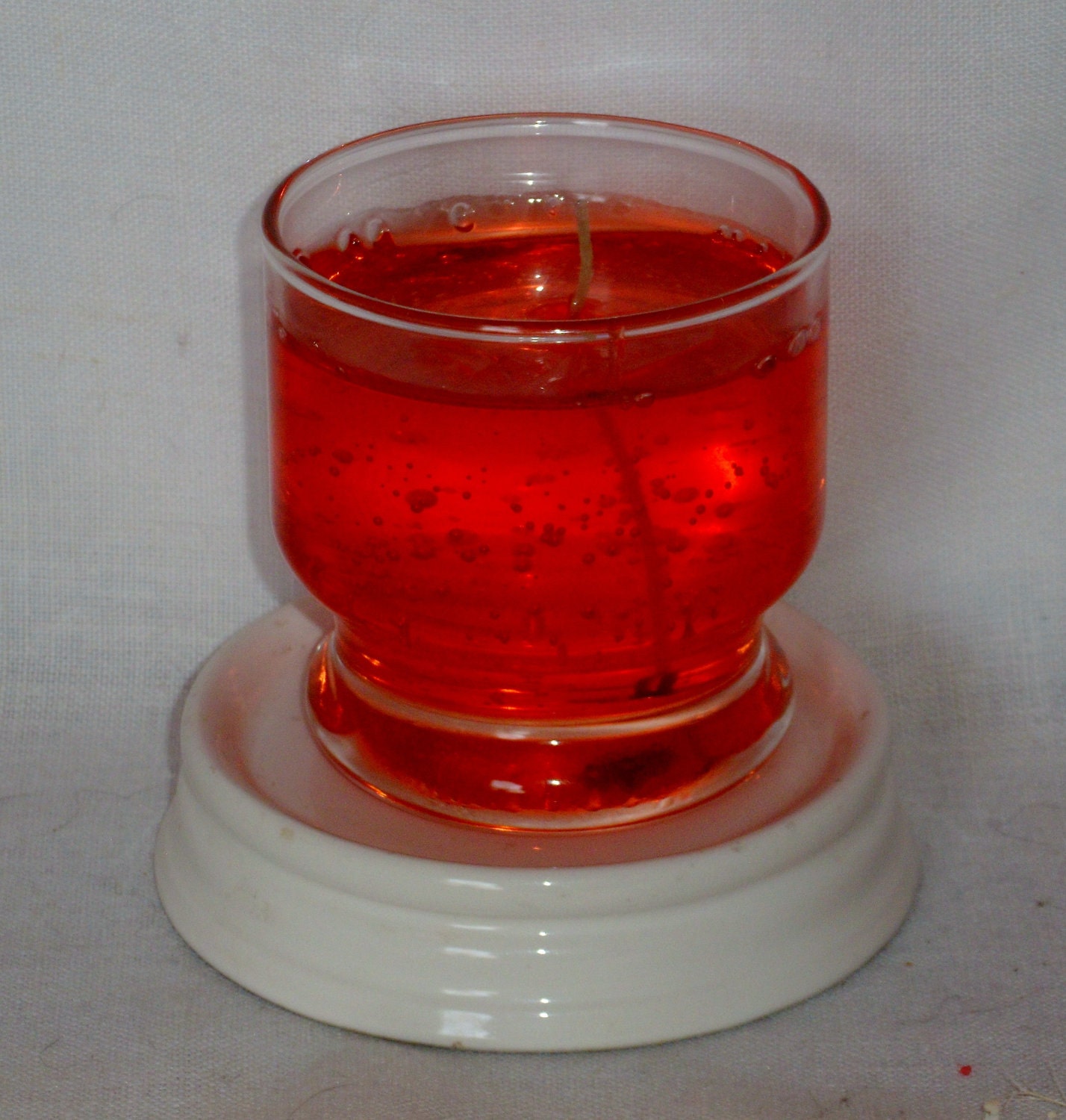 Gel candle of Cinnamon scent in glass container
