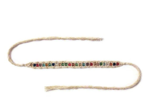 Friendship bracelet with multicolor beads in ecru color
