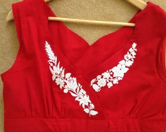 Red cotton dress emboridered with white Kalocsa motif