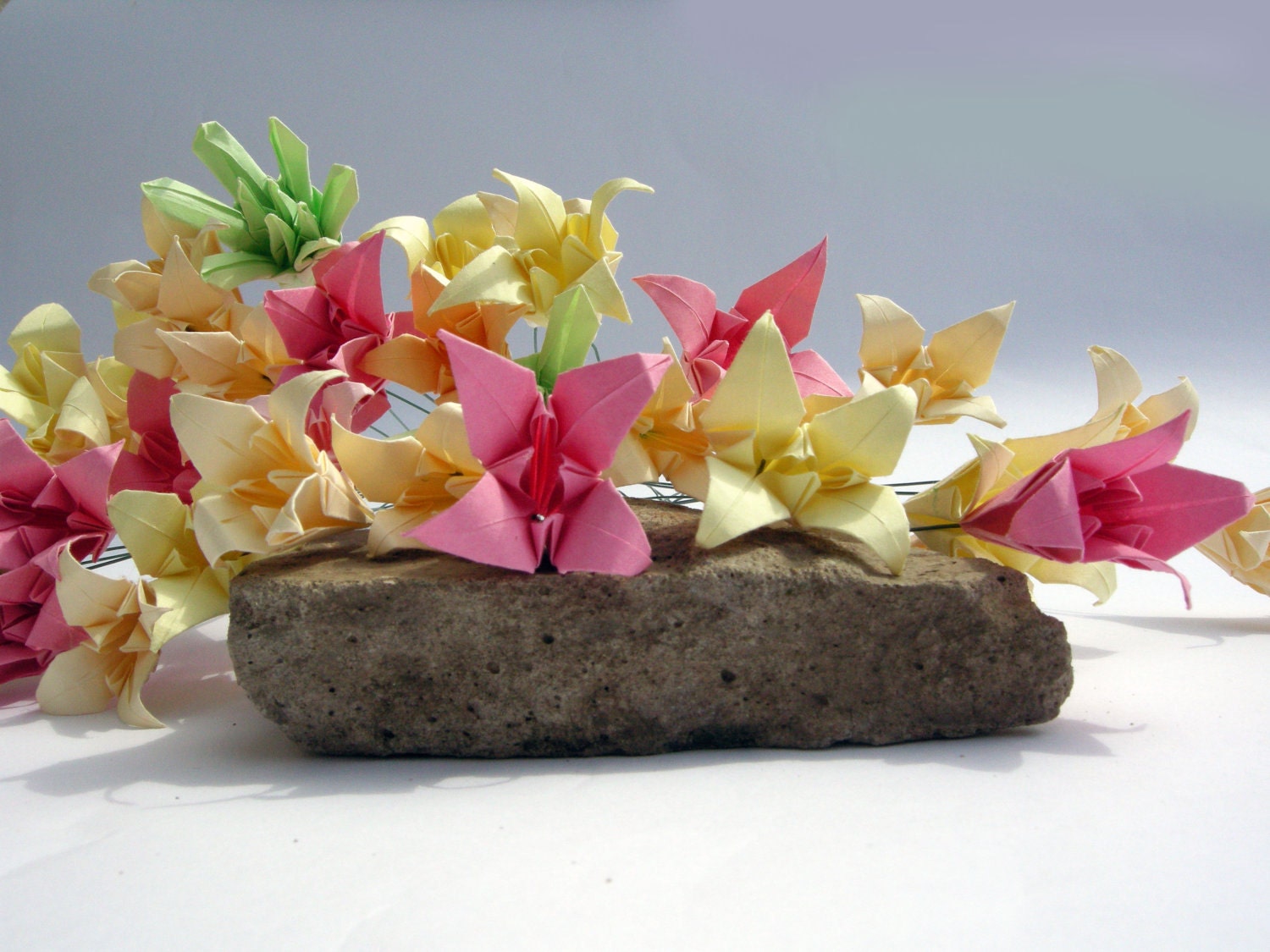 Paper flowers - Irises in Pink, Apricot and Pale Yellow, and three of other kind flowers in Green
